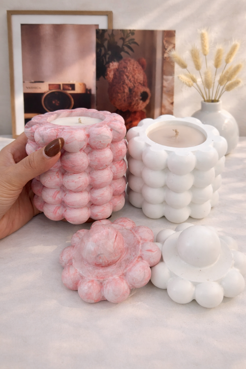 Aesthetic bubble jar candle in a white  & marble effect hand-cast textured vessel with a matching lid.
