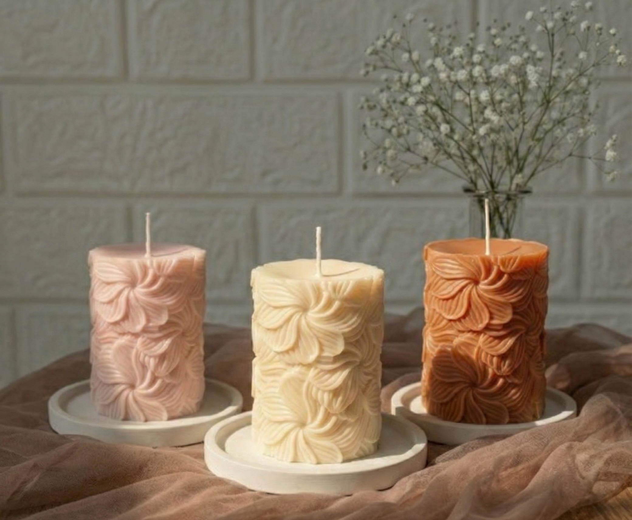 Our Wind Whirl Pillar Candle combines soft floral detailing with a smooth, creamy finish. Made using high-quality soy wax, it burns cleanly and looks stunning as décor, adding a touch of natural elegance wherever you place it.
